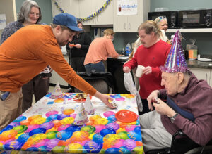 group of people celebrating a birthday