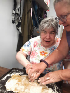 woman using a dog biscuit cutter