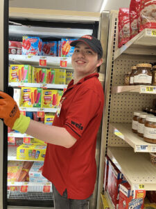 Tanner stocking frozen aisle